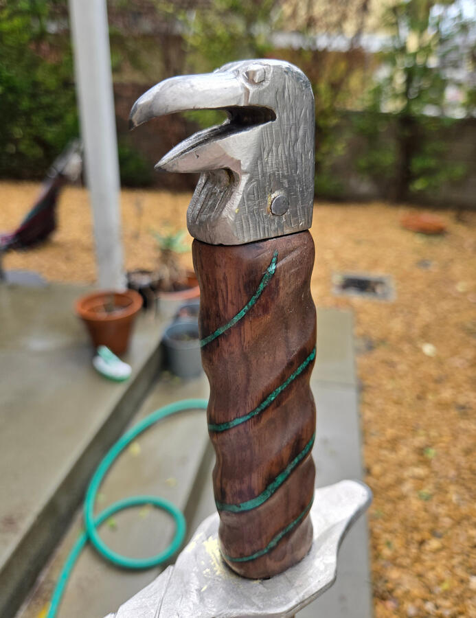 Corax grip and pommel