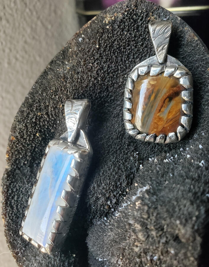 Pendants. Pietersite and moonstone in silver.