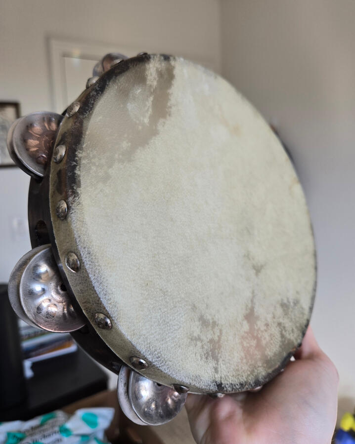 Tambourine. Goatskin head, handhammered zills.